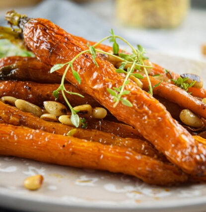 Brown sugar glazed mini carrots recipe image