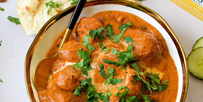 butter chicken with rice and naan bread