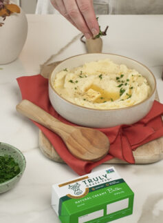 mashed potatoes in a bowl with butter melting